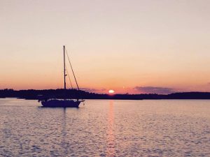 sailing out at sunset