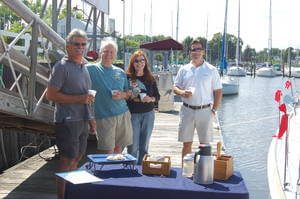 group toasting new boat