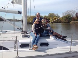 happy family on new sailboat