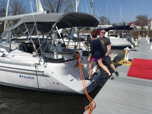 happy owners boarding new boat